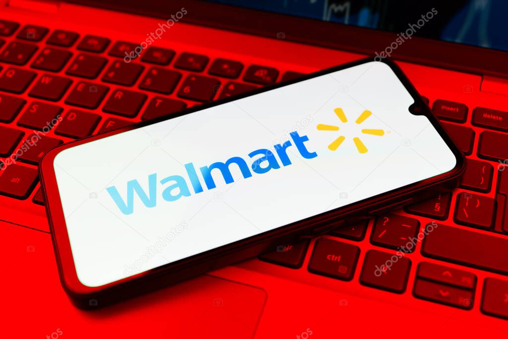 Prague, Czechia - 10 21 2024: Smartphone on surface showing Walmart logo.
