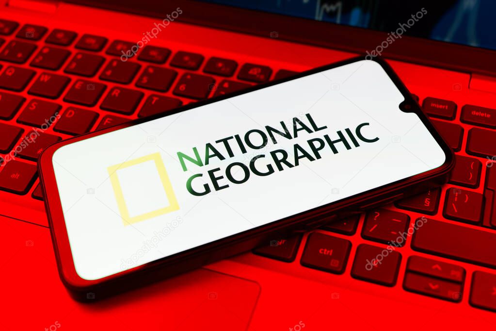 Prague, Czechia - 10 21 2024: Smartphone on surface showing National Geographic logo.