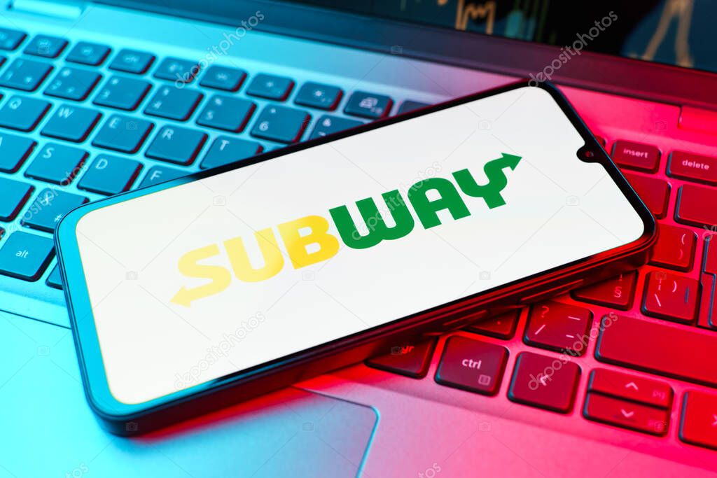 Prague, Czechia - 10 21 2024: Smartphone on surface showing Subway logo.