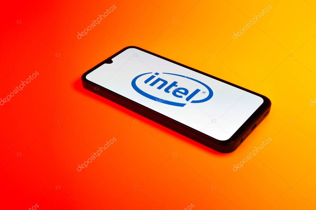 Prague, Czechia - 10 21 2024: Smartphone on surface showing Intel logo.