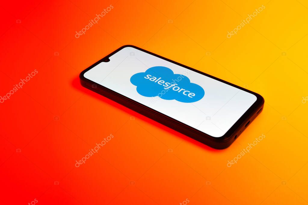 Prague, Czechia - 10 21 2024: Smartphone on surface showing Salesforce logo.