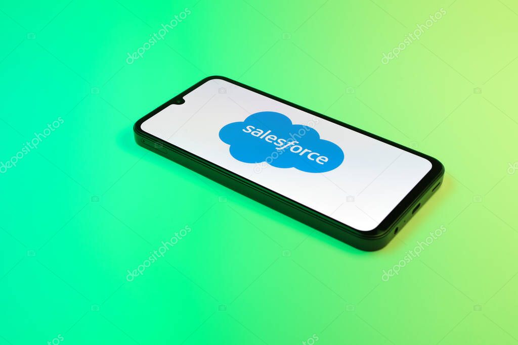 Prague, Czechia - 10 21 2024: Smartphone on surface showing Salesforce logo.