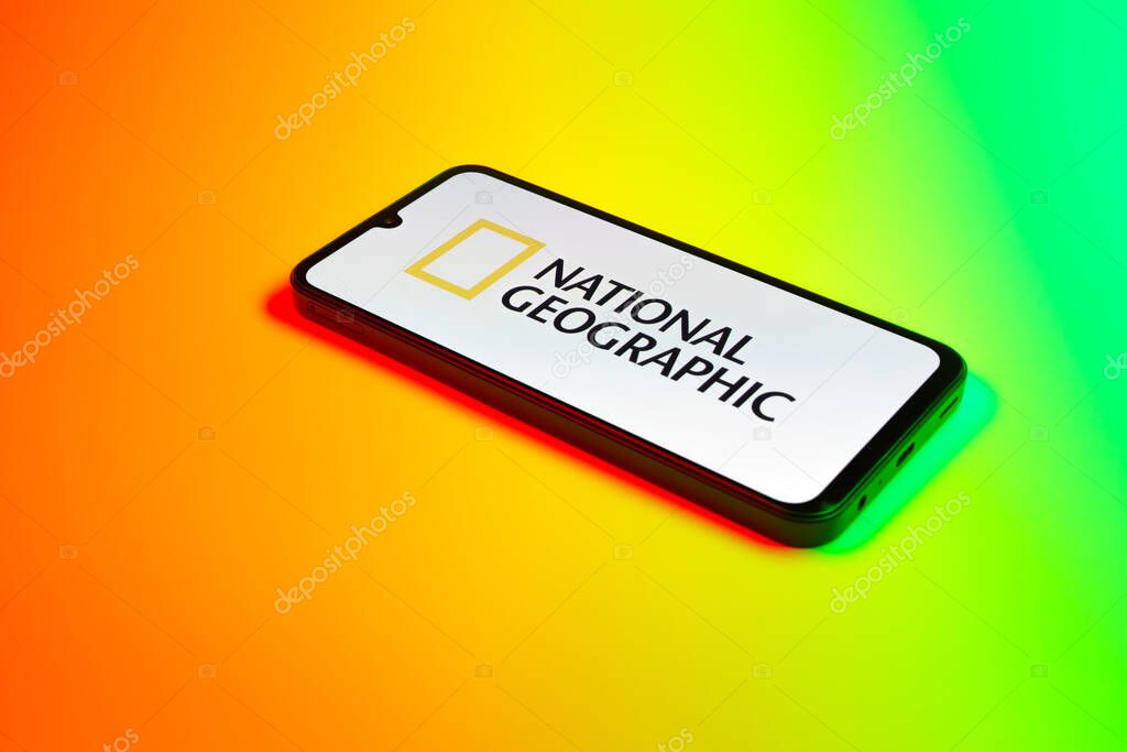 Prague, Czechia - 10 21 2024: Smartphone on surface showing National Geographic logo.