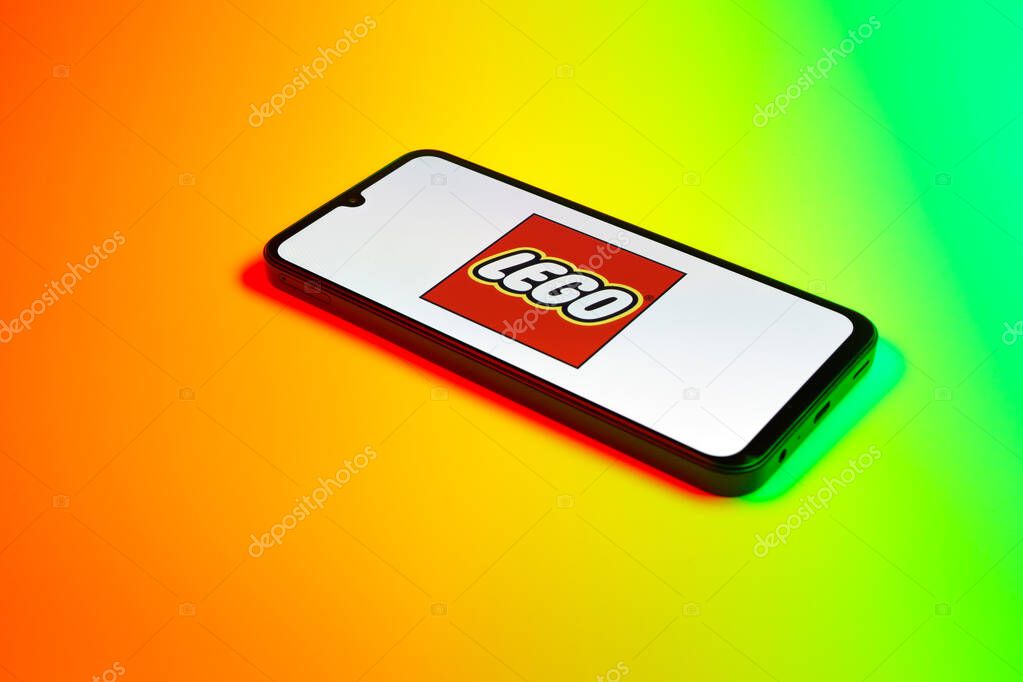 Prague, Czechia - 10 21 2024: Smartphone on surface showing Lego logo.