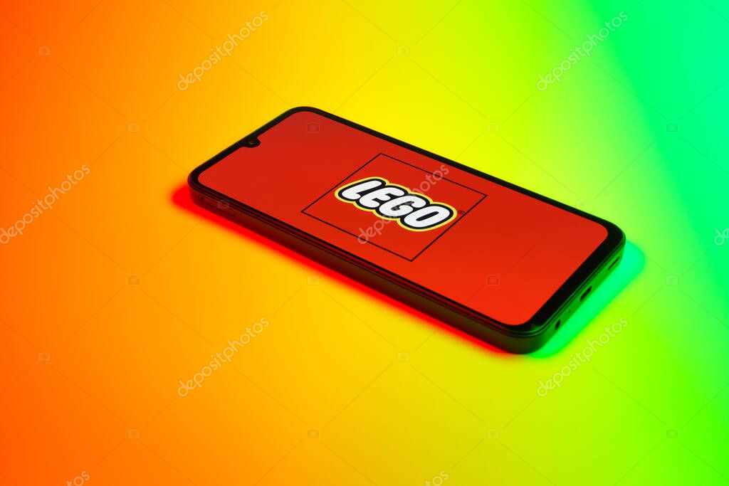 Prague, Czechia - 10 21 2024: Smartphone on surface showing Lego logo.