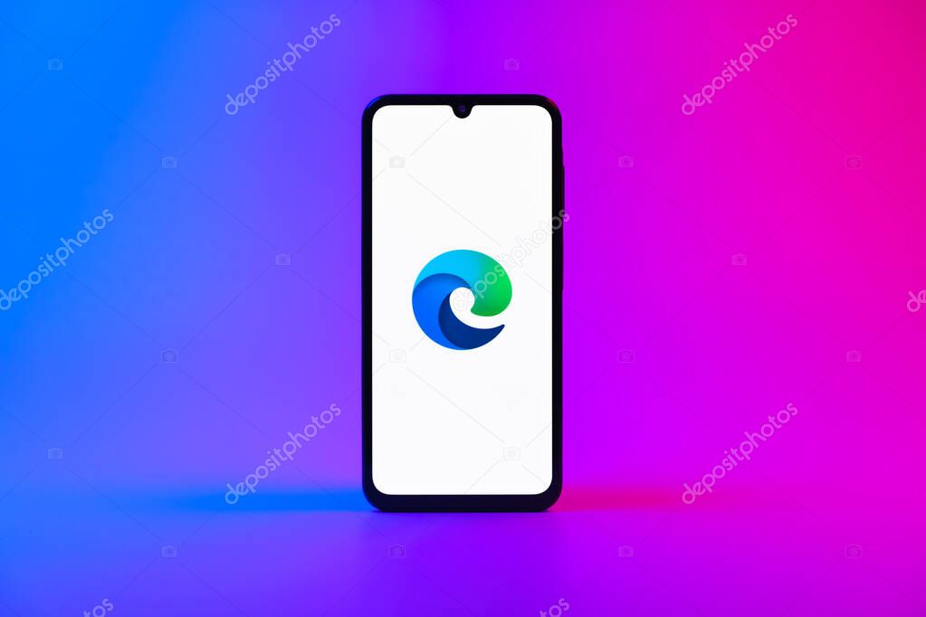 Prague, Czechia - 10 21 2024: Smartphone on surface showing Edge logo.