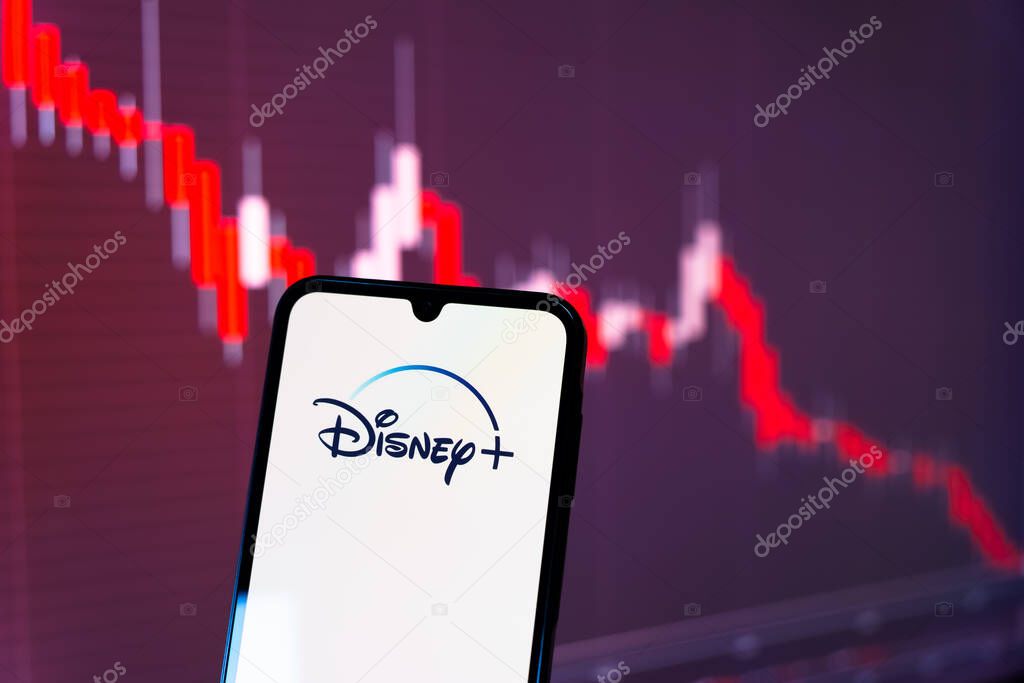 Prague, Czechia - 10 21 2024: Smartphone on surface showing Disney + logo.