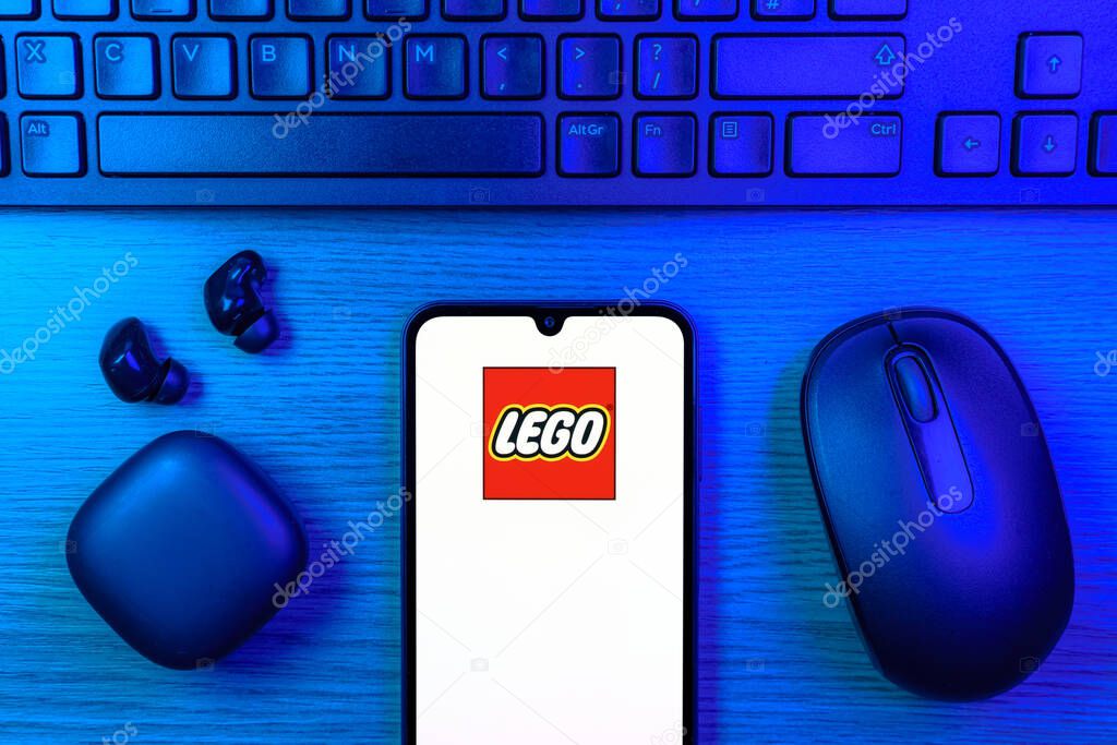 Prague, Czechia - 10 21 2024: Smartphone on surface showing Lego logo.