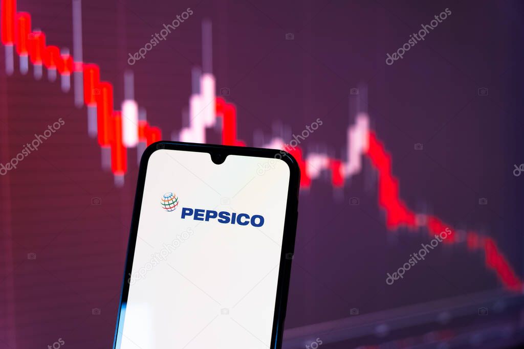 Prague, Czechia - 10 21 2024: Smartphone on surface showing Pepsico logo.