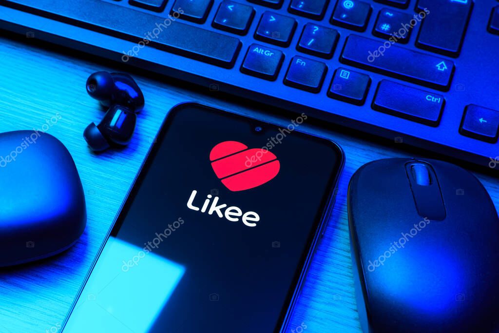 Prague, Czechia - 10 21 2024: Smartphone on surface showing Likee logo.
