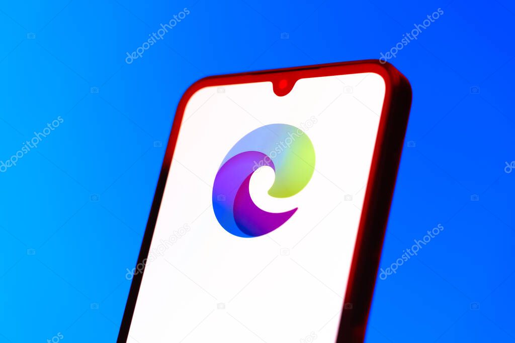 Prague, Czechia - 10 21 2024: Smartphone on surface showing Edge logo.