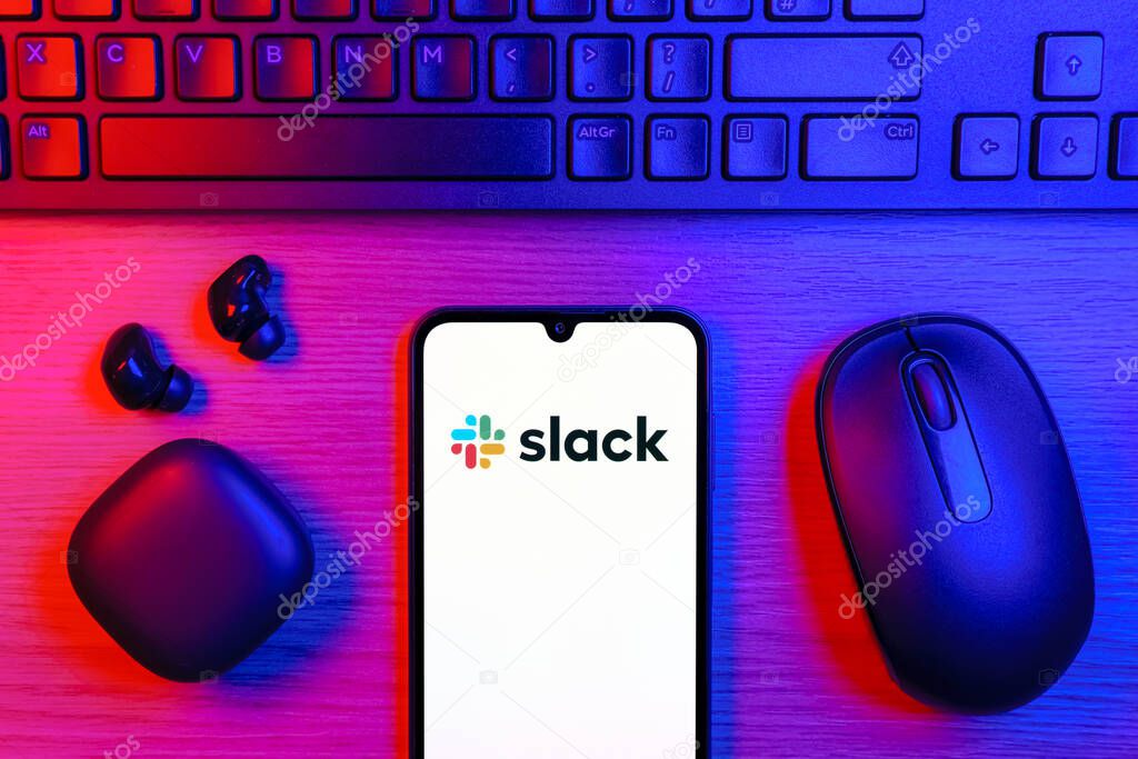 Prague, Czechia - 10 21 2024: Smartphone on surface showing Slack logo.