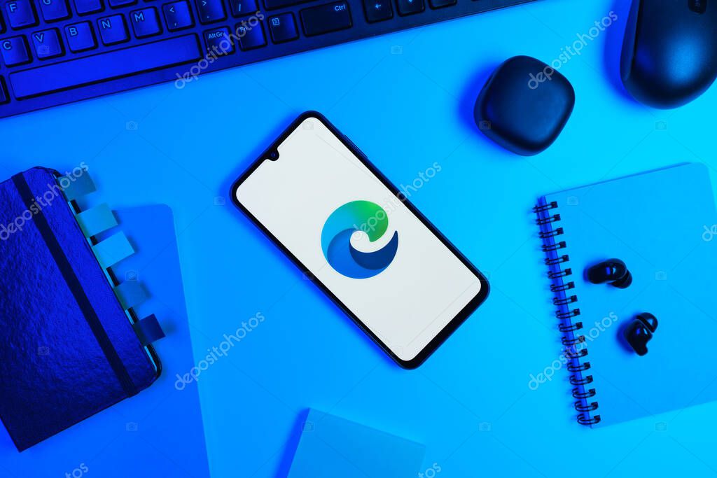 Prague, Czechia - 10 21 2024: Smartphone on surface showing Edge logo.