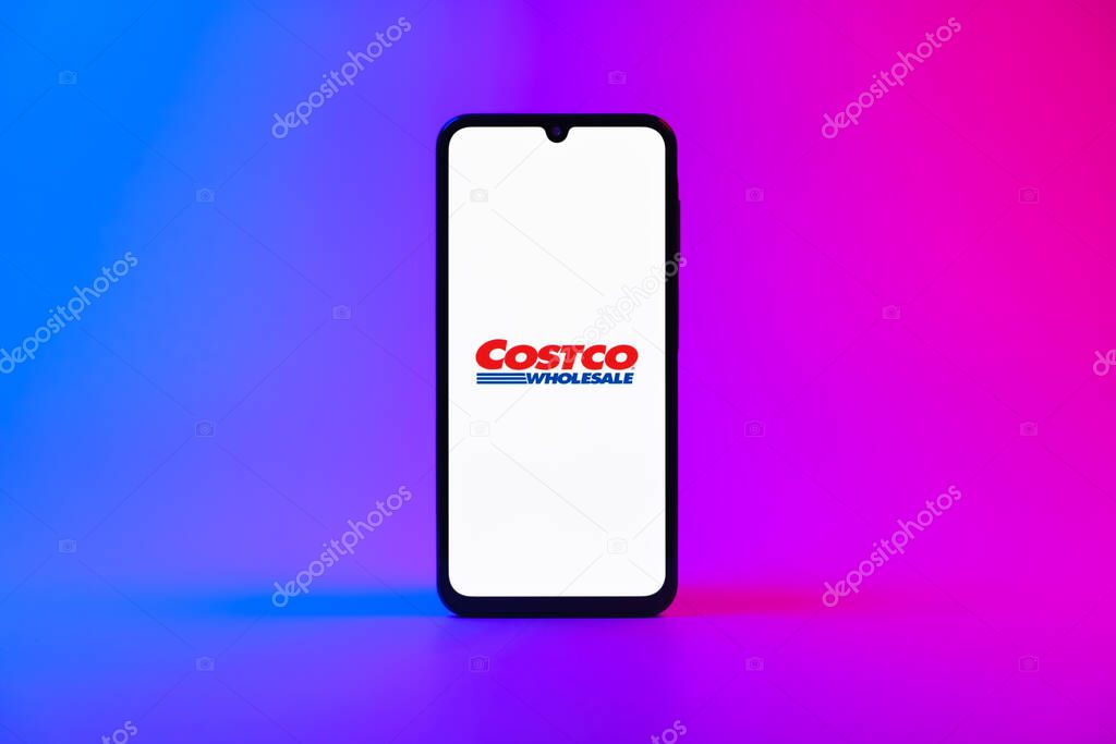 Prague, Czechia - 10 21 2024: Smartphone on surface showing Costco logo.