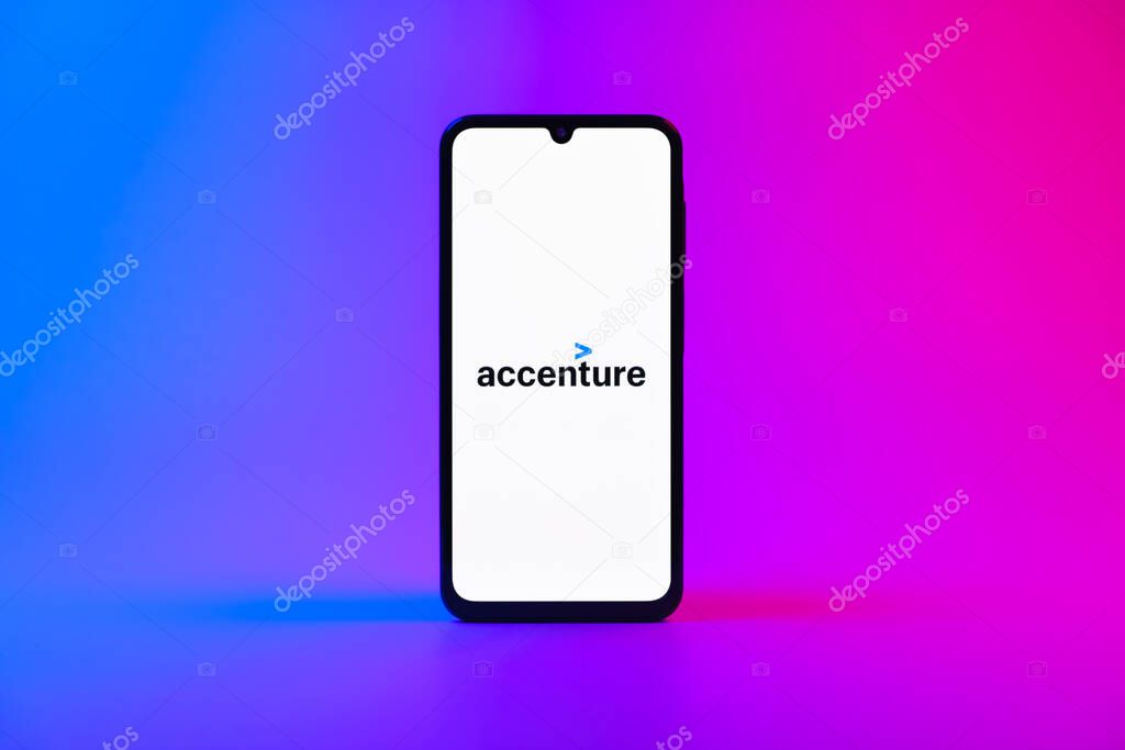 Prague, Czechia - 10 21 2024: Smartphone on surface showing Accenture logo.