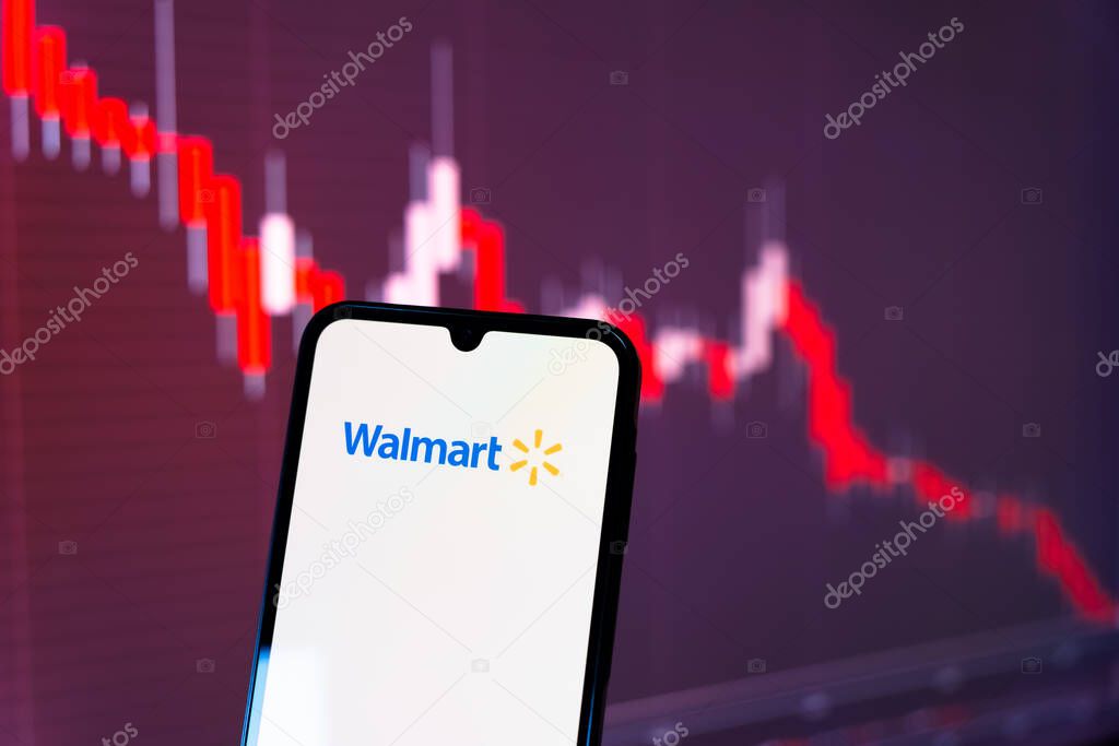 Prague, Czechia - 10 21 2024: Smartphone on surface showing Walmart logo.