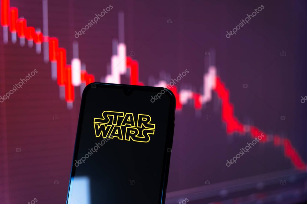 Prague, Czechia - 10 21 2024: Smartphone on surface showing Star Wars logo.