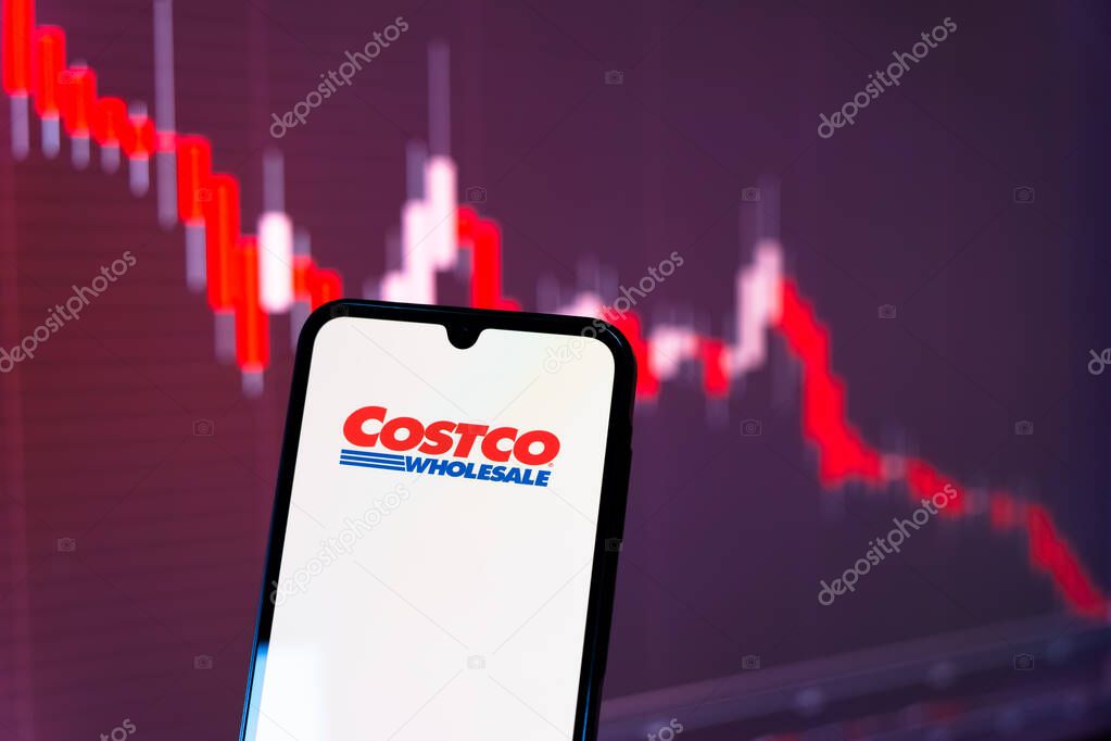 Prague, Czechia - 10 21 2024: Smartphone on surface showing Costco logo.