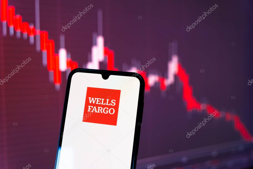 Prague, Czechia - 10 21 2024: Smartphone on surface showing Wells Fargo logo.