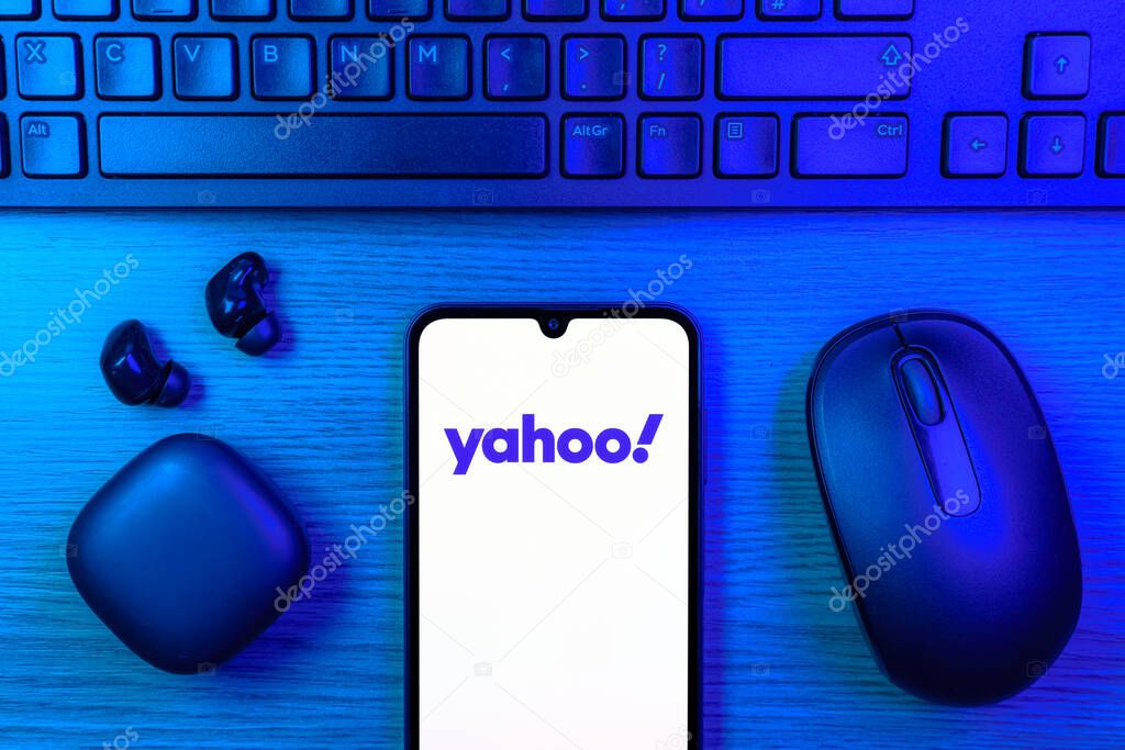 Prague, Czechia - 10 21 2024: Smartphone on surface showing Yahoo logo.