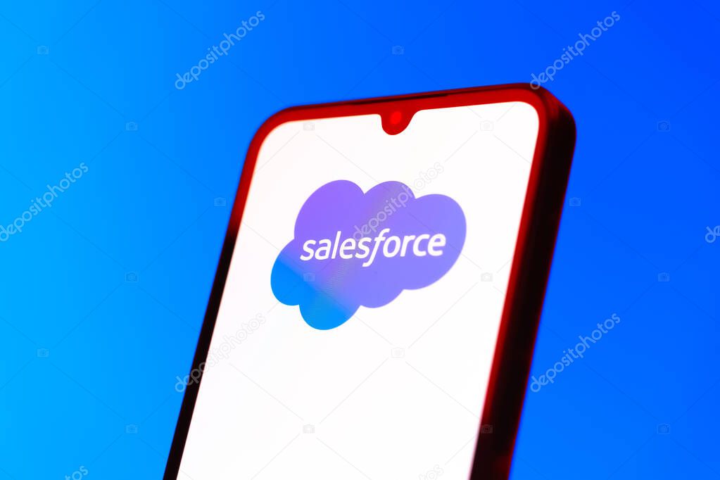 Prague, Czechia - 10 21 2024: Smartphone on surface showing Salesforce logo.