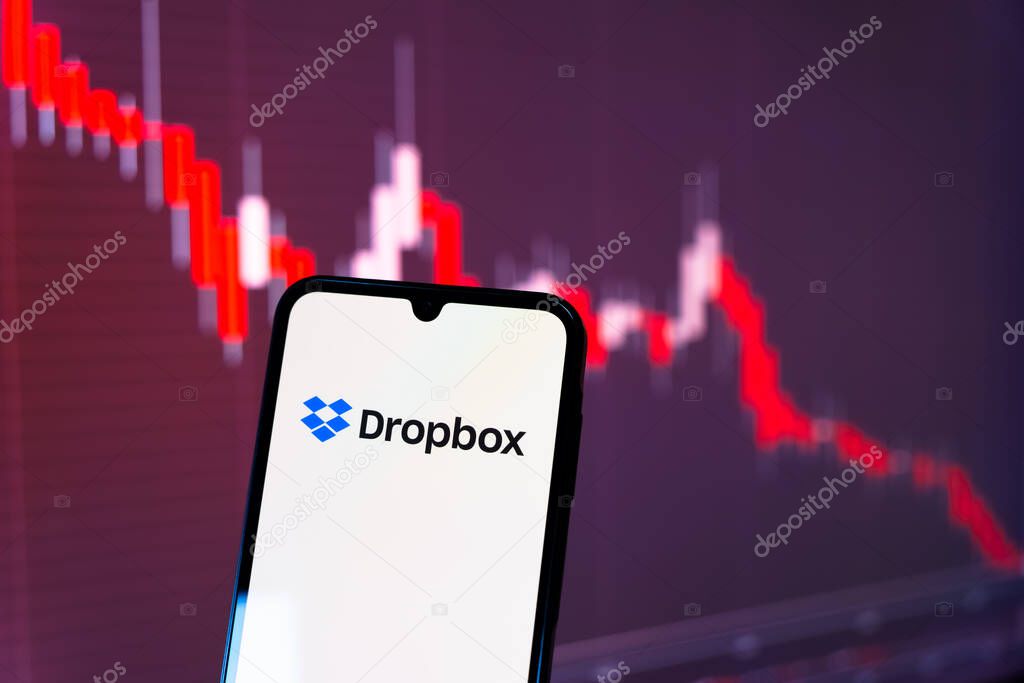 Prague, Czechia - 10 21 2024: Smartphone on surface showing Dropbox logo.