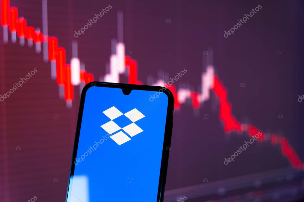 Prague, Czechia - 10 21 2024: Smartphone on surface showing Dropbox logo.