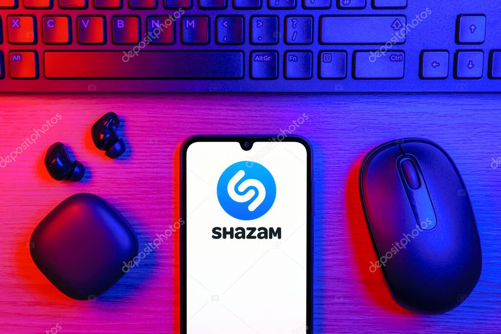Prague, Czechia - 10 21 2024: Smartphone on surface showing Shazam logo.