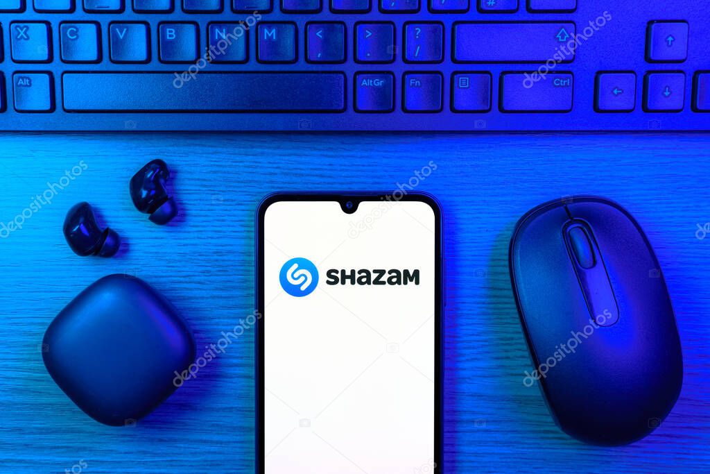 Prague, Czechia - 7 20 2024: Smartphone on surface showing Shazam logo