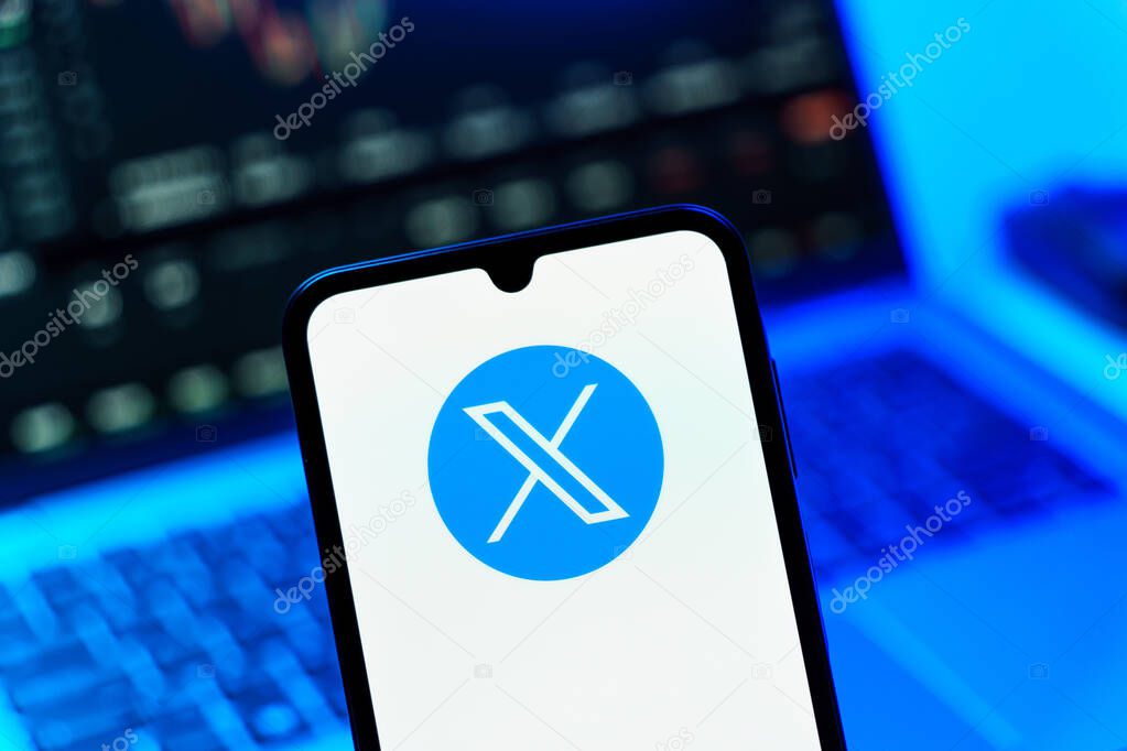 Prague, Czechia - 8 20 2024: Smartphone on surface showing social network X logo.