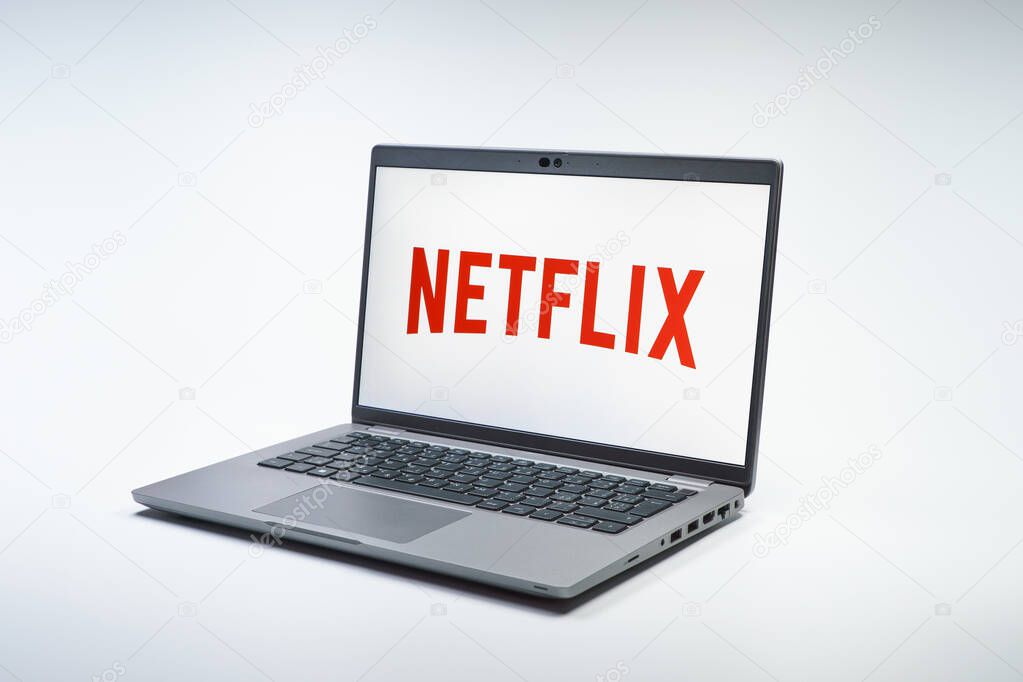 Prague, Czechia - 02 21 2025: Laptop on surface showing Netflix logo.