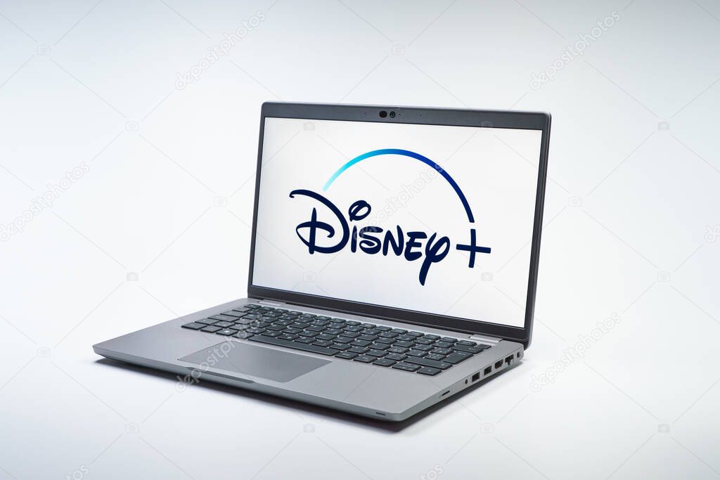 Prague, Czechia - 02 21 2025: Laptop on surface showing Disney + logo.
