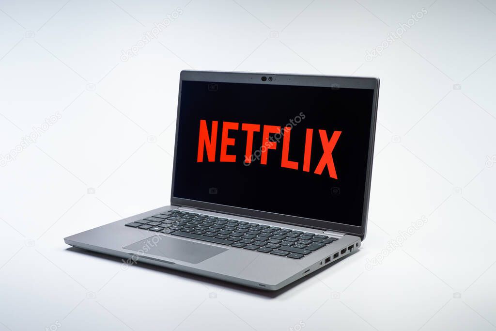 Prague, Czechia - 02 21 2025: Laptop on surface showing Netflix logo.