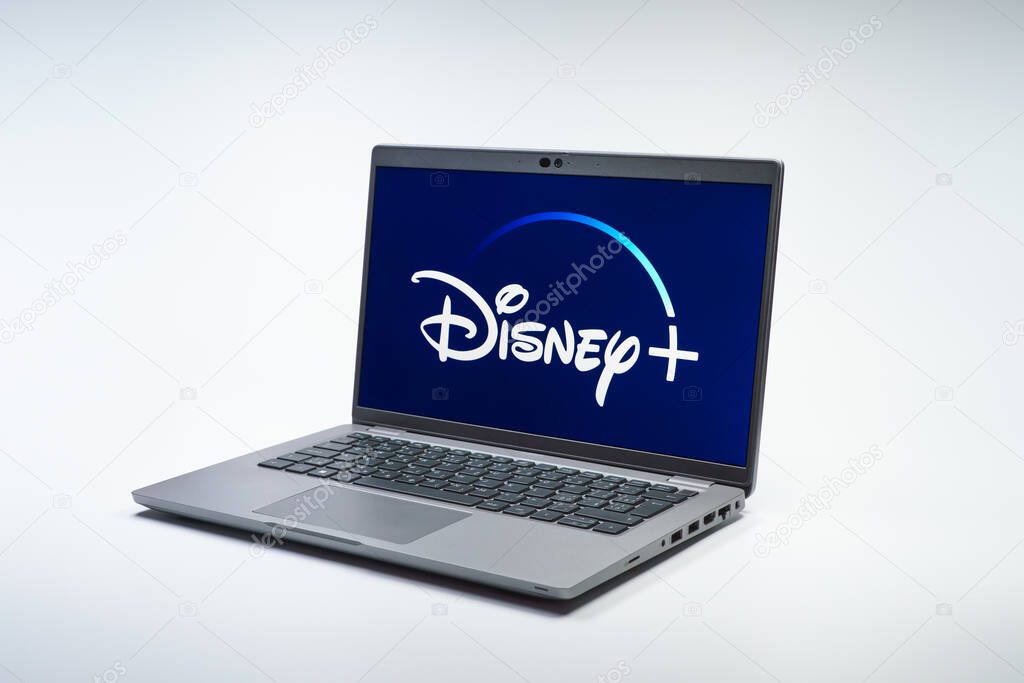 Prague, Czechia - 02 21 2025: Laptop on surface showing Disney + logo.