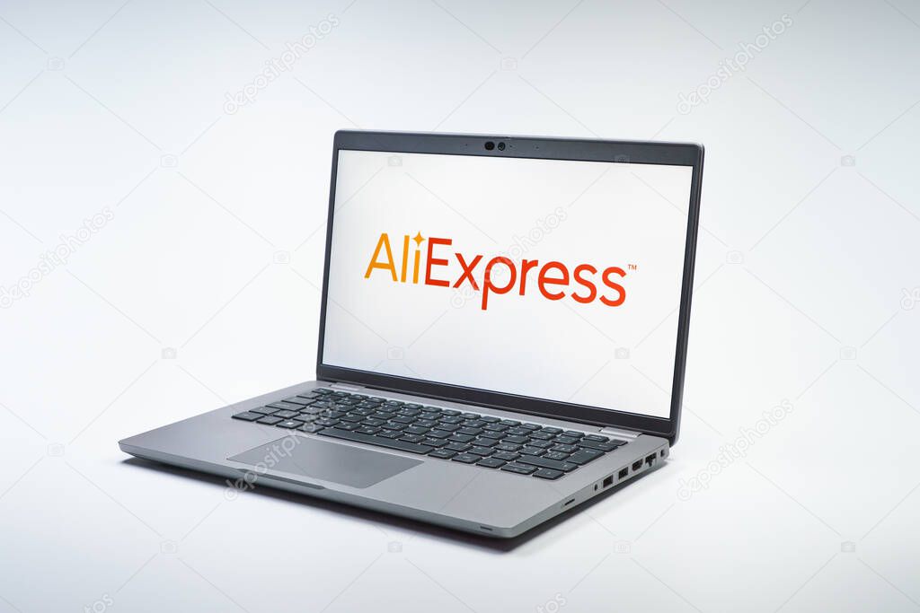 Prague, Czechia - 02 21 2025: Laptop on surface showing AliExpress logo.