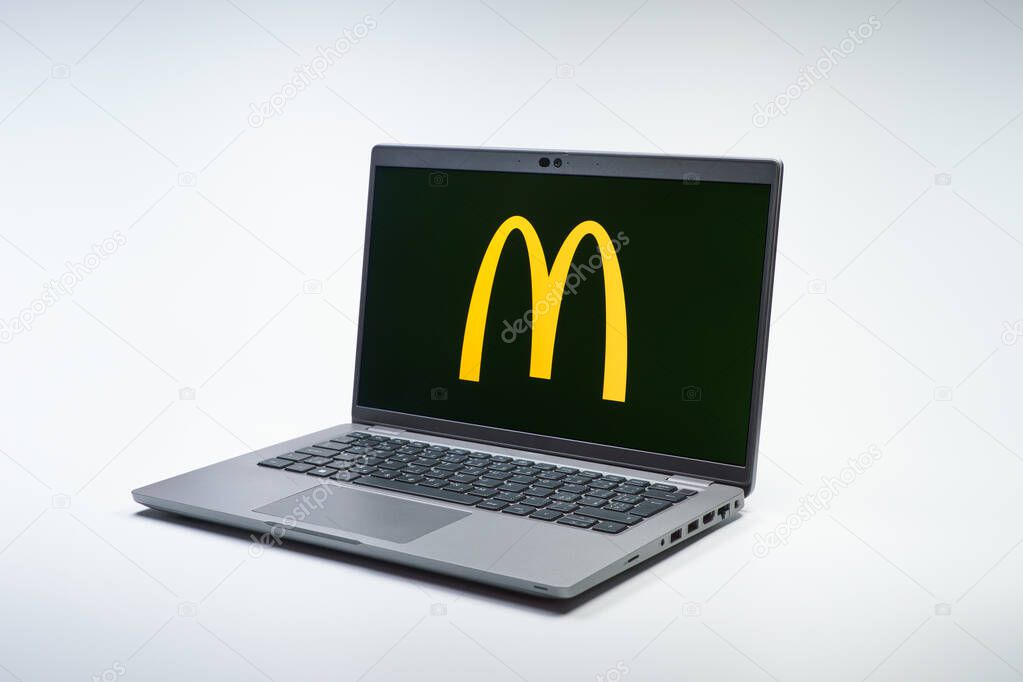 Prague, Czechia - 02 21 2025: Laptop on surface showing McDonalds logo.