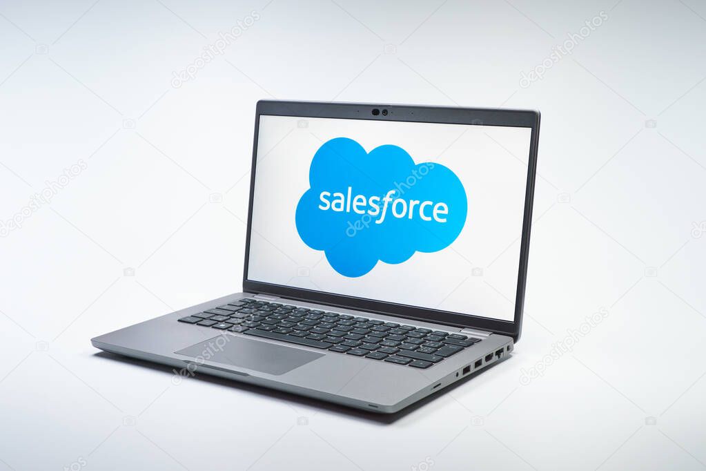 Prague, Czechia - 02 21 2025: Laptop on surface showing Salesforce logo.