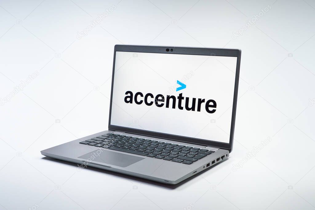 Prague, Czechia - 02 21 2025: Laptop on surface showing Accenture logo.