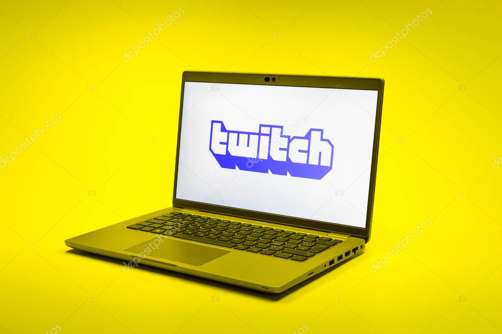 Prague, Czechia - 02 21 2025: Laptop on surface showing Twitch logo.
