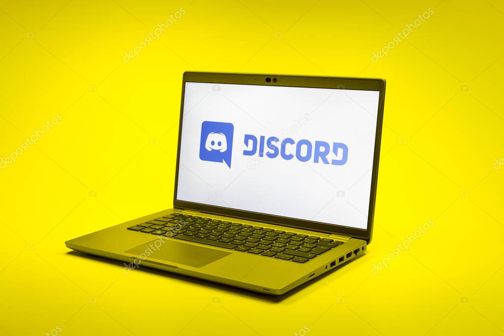 Prague, Czechia - 02 21 2025: Laptop on surface showing Discord logo.