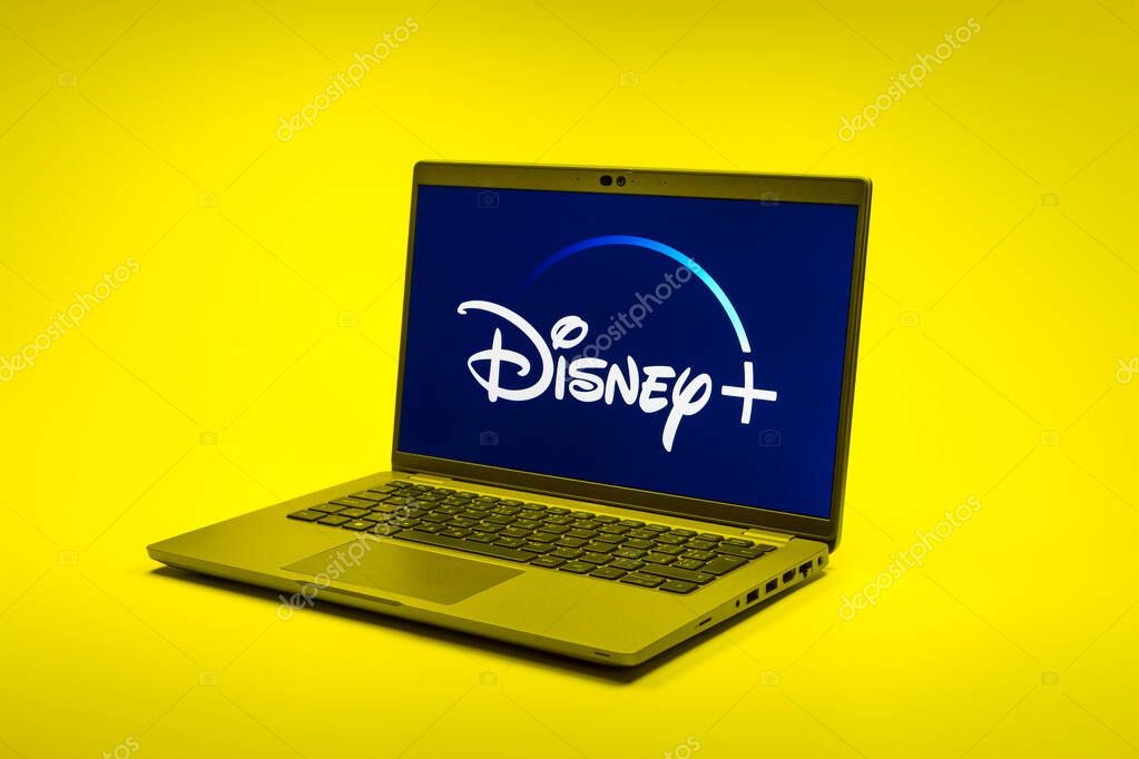 Prague, Czechia - 02 21 2025: Laptop on surface showing Disney + logo.