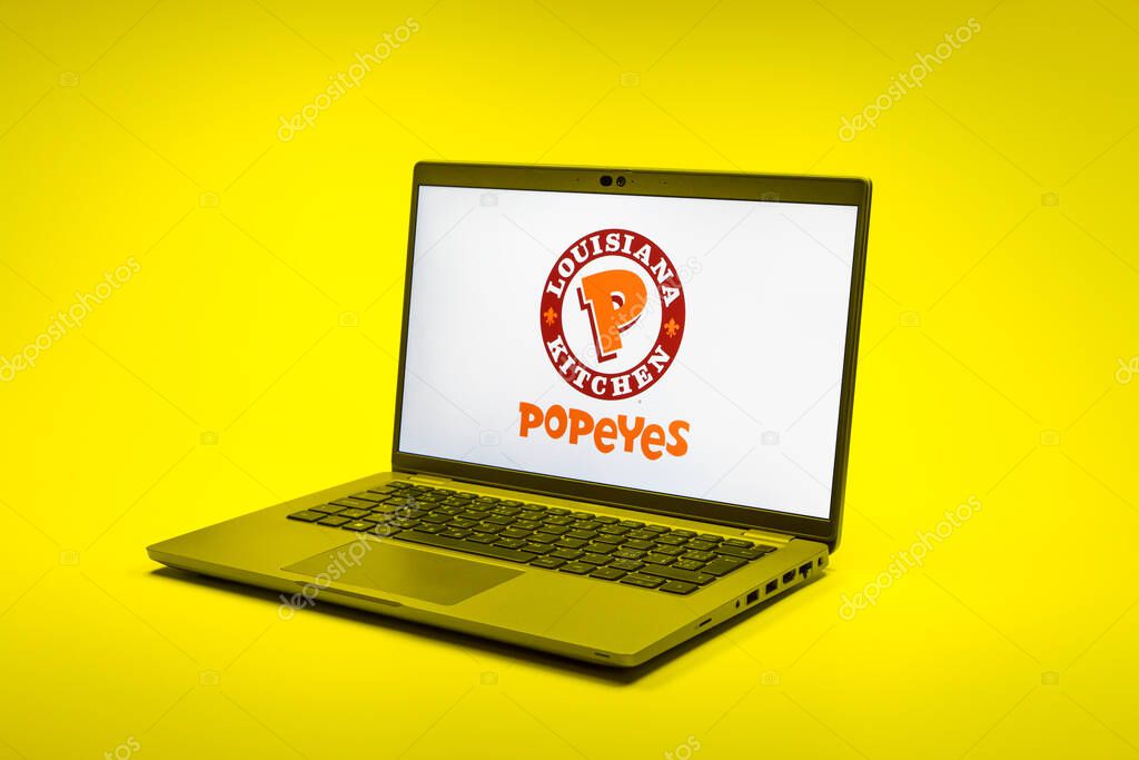 Prague, Czechia - 02 21 2025: Laptop on surface showing Popeyes logo.
