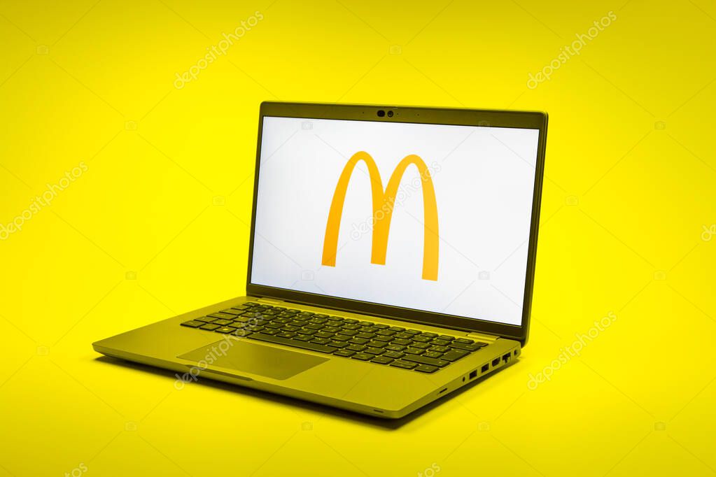 Prague, Czechia - 02 21 2025: Laptop on surface showing McDonalds logo.