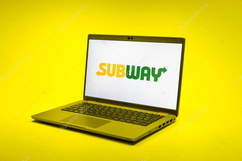 Prague, Czechia - 02 21 2025: Laptop on surface showing Subway logo.