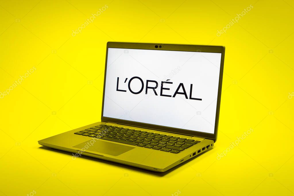Prague, Czechia - 02 21 2025: Laptop on surface showing L'Oreal logo.