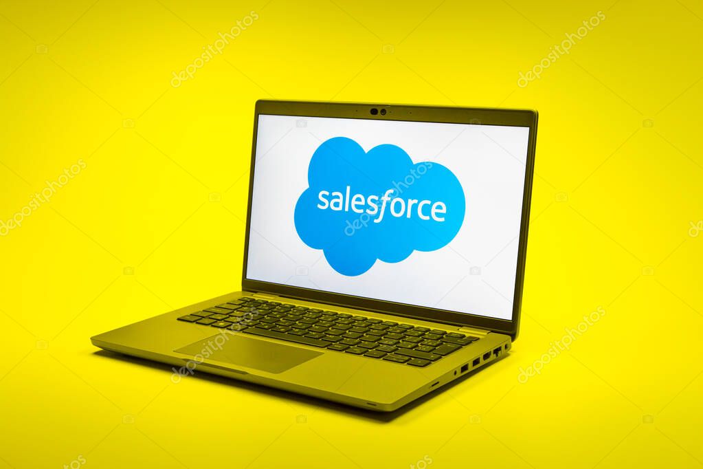 Prague, Czechia - 02 21 2025: Laptop on surface showing Salesforce logo.