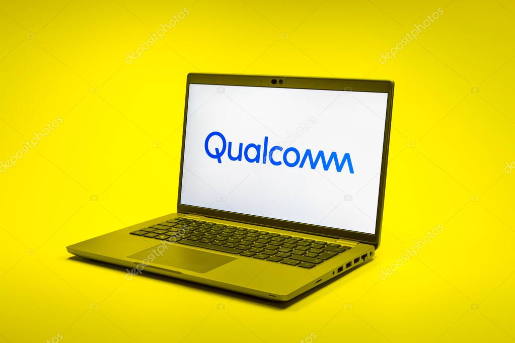 Prague, Czechia - 02 21 2025: Laptop on surface showing Qualcomm logo.