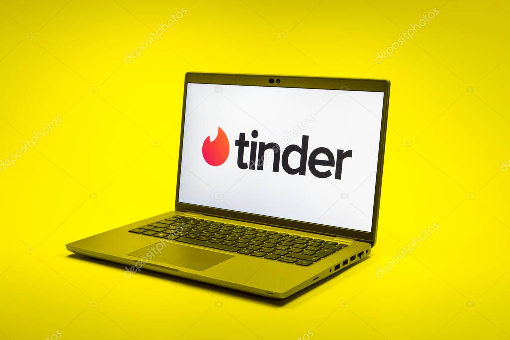 Prague, Czechia - 02 21 2025: Laptop on surface showing Tinder logo.