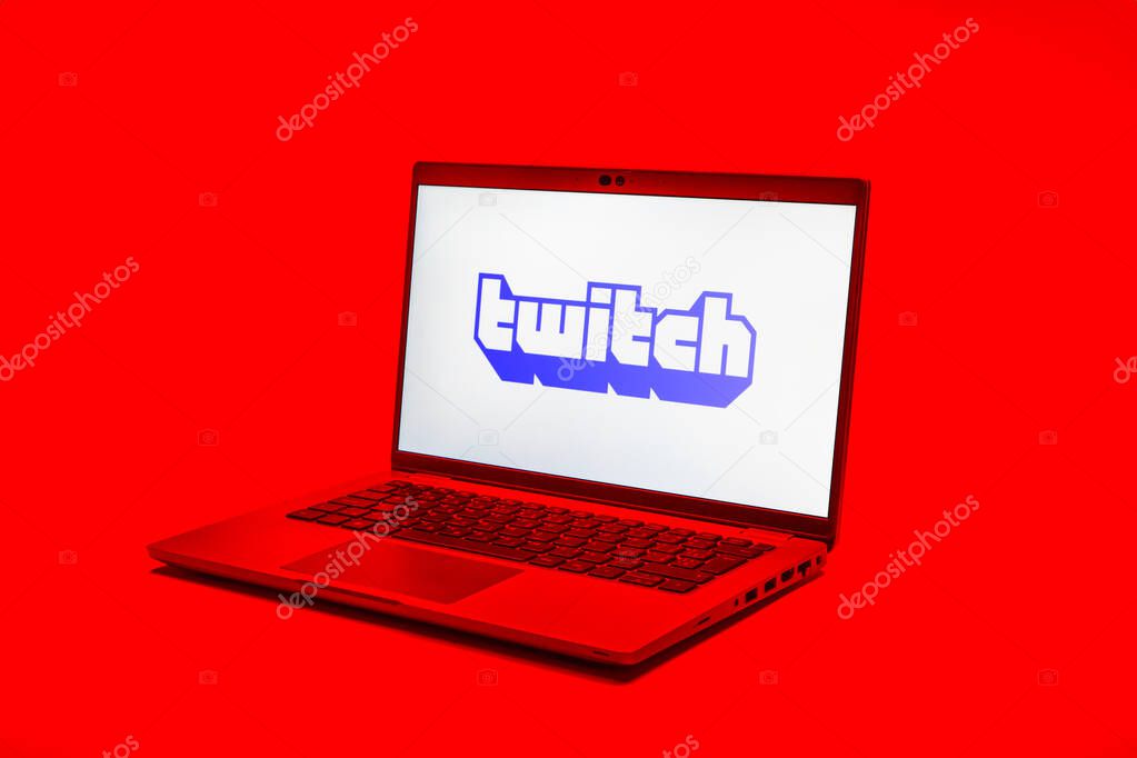Prague, Czechia - 02 21 2025: Laptop on surface showing Twitch logo.