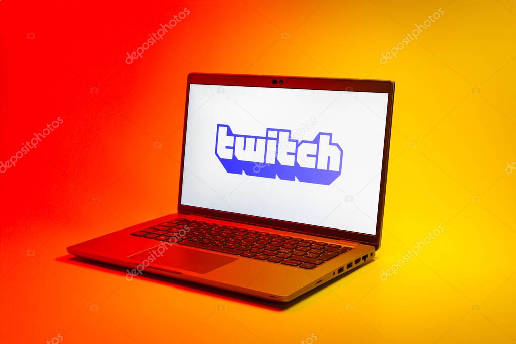 Prague, Czechia - 02 21 2025: Laptop on surface showing Twitch logo.